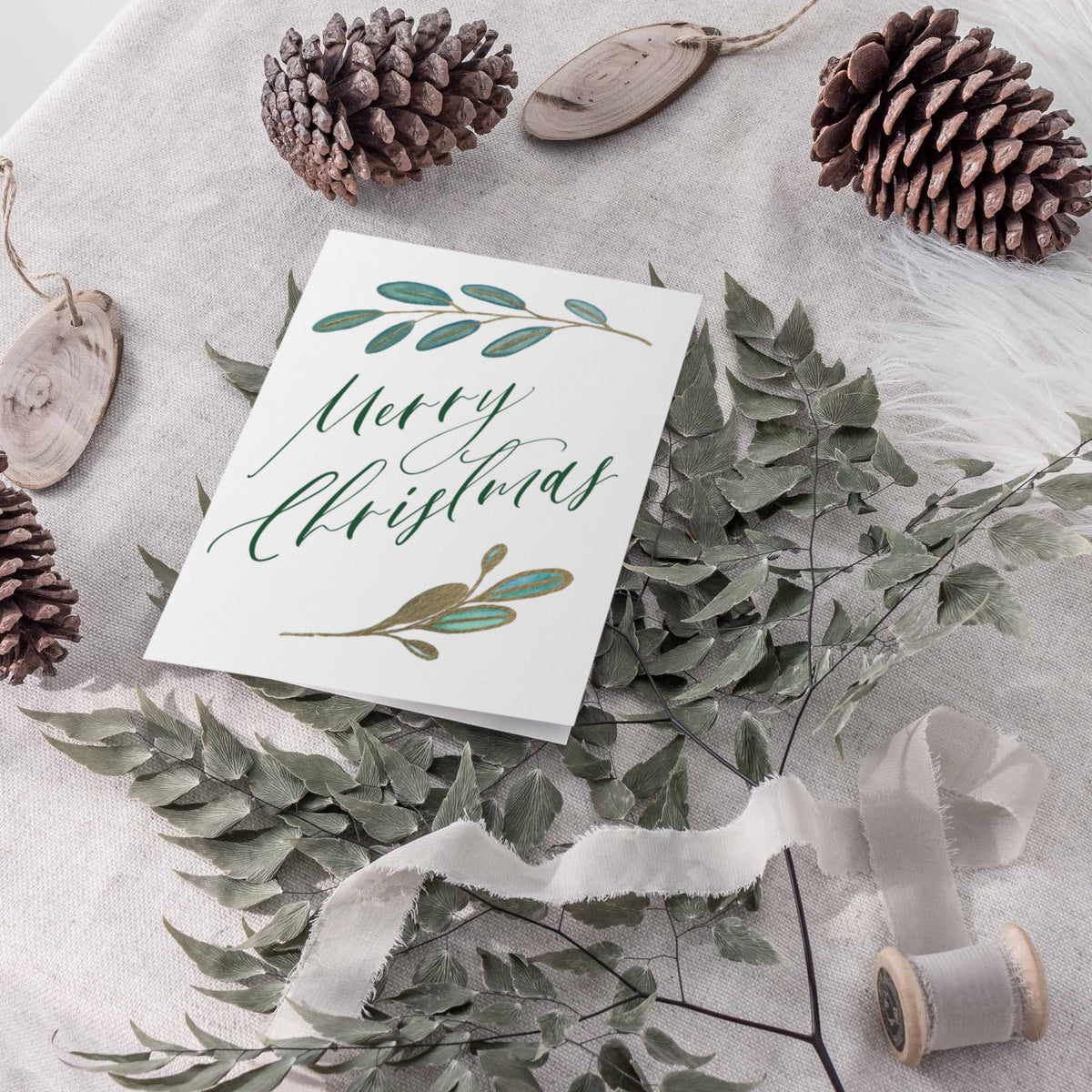 Green and gold watercolor Christmas cards with botanical illustrations, 3 cards per design, 24 total.