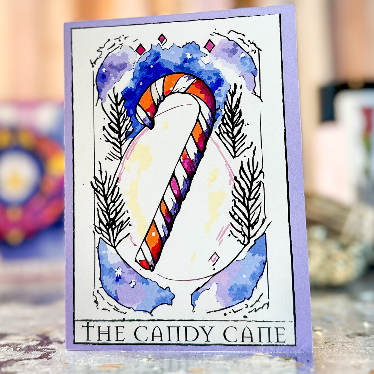 Cards range in border color from dark navy and plum to magenta, periwinkle, red, and slate blue-gray.