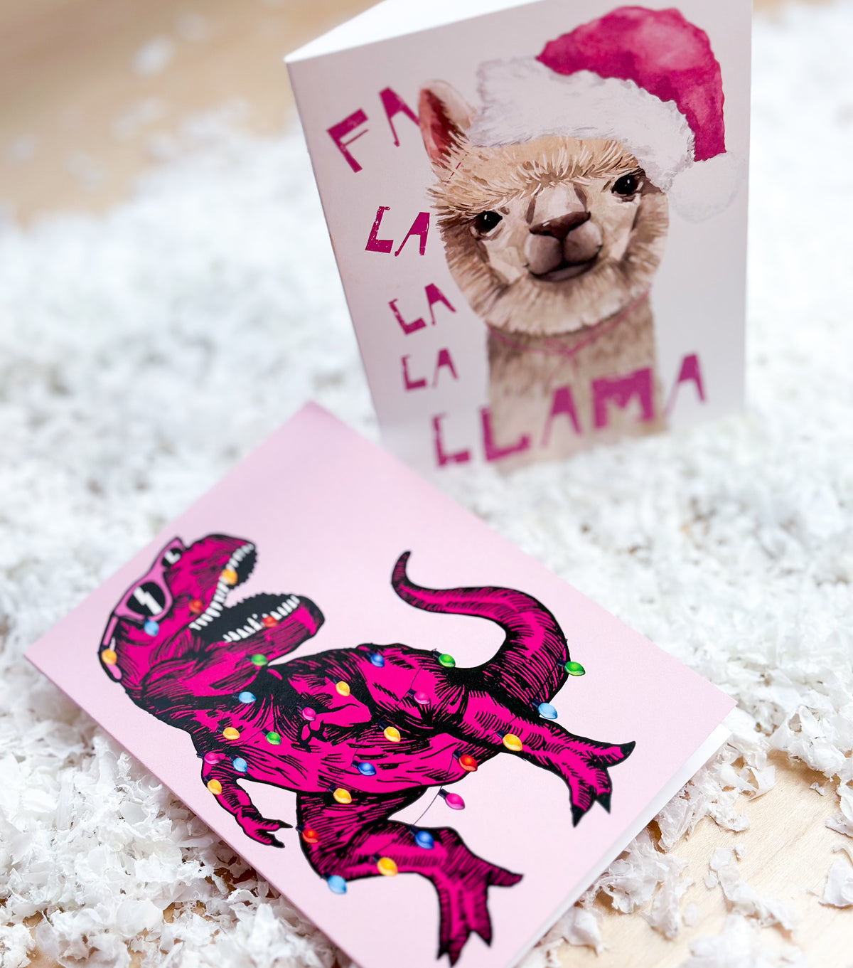 Holiday card set with phrases including Sleigh All Day, Berry Christmas, Fa la la la Llama, and Peace on Earth.