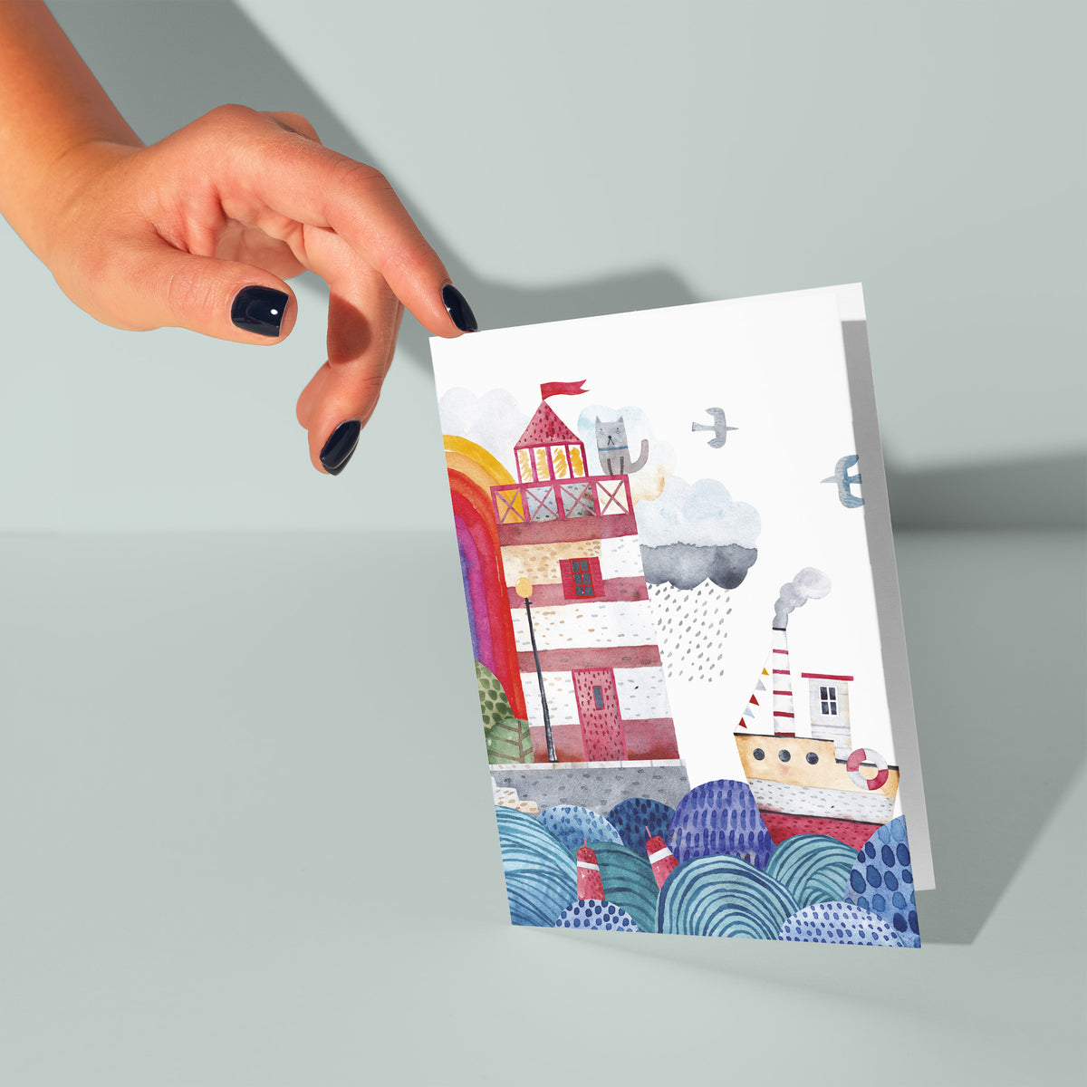 Card set with full-bleed artwork showing topiary shrubs, a lamppost, and pennant bunting details.