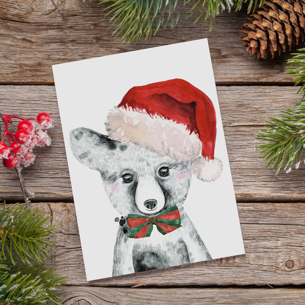 24-count holiday card pack, four designs, fine line animal portraits with colored knitwear on plain white cards.