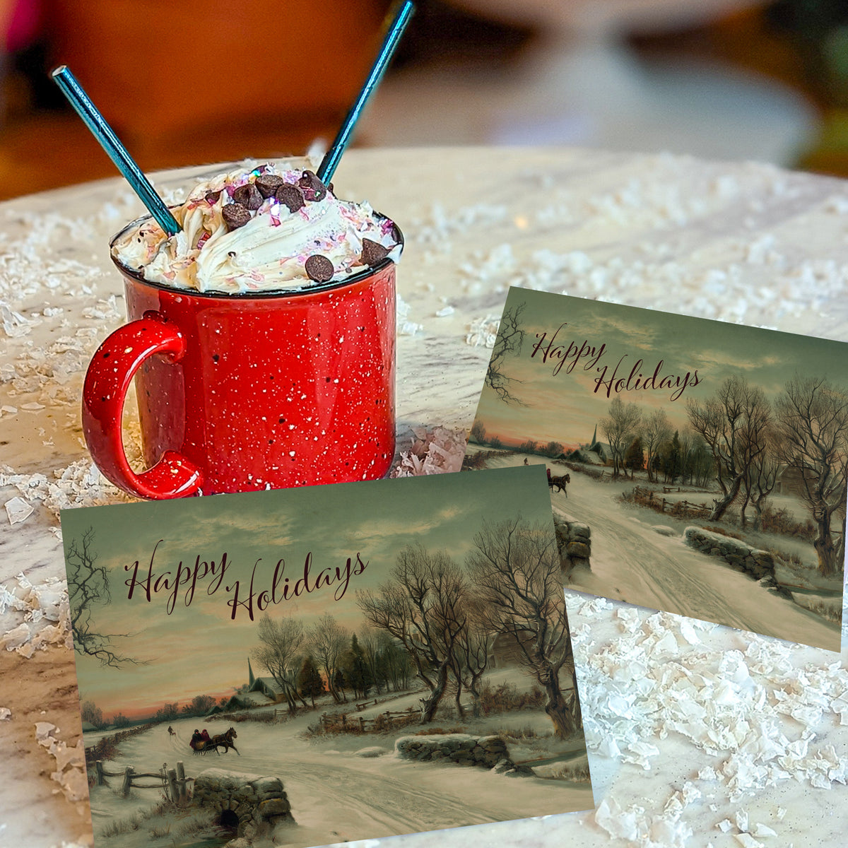 "Happy Holidays" in staggered maroon calligraphic script over a painted winter landscape with sleigh and evergreens.