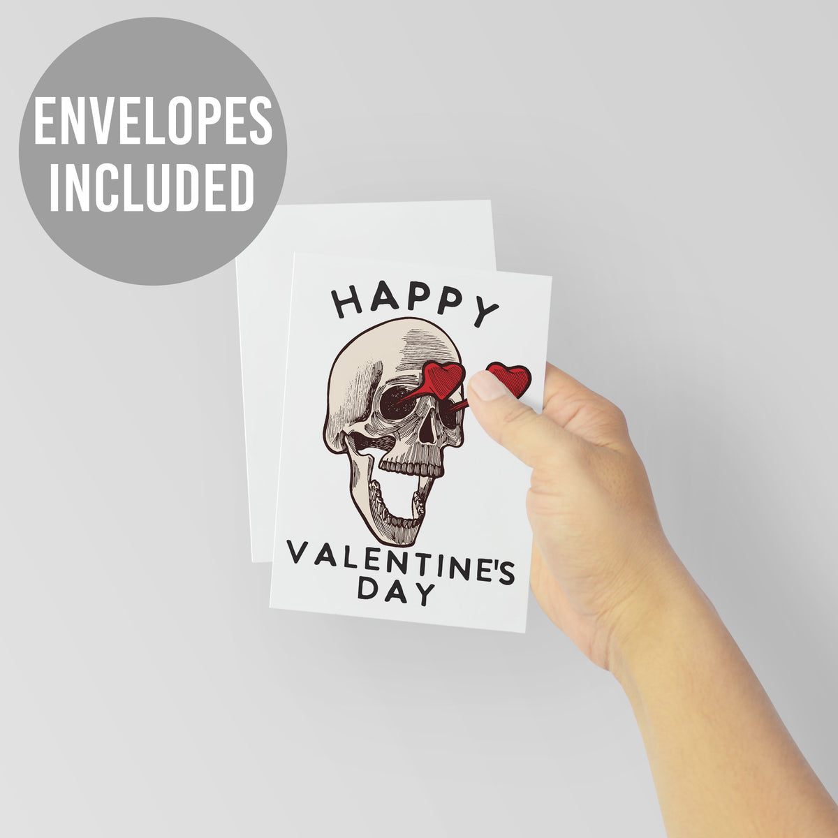 Skull Valentine card with engraving-style linework, solid red heart glasses, and "HAPPY VALENTINE'S DAY" in wide-spaced block