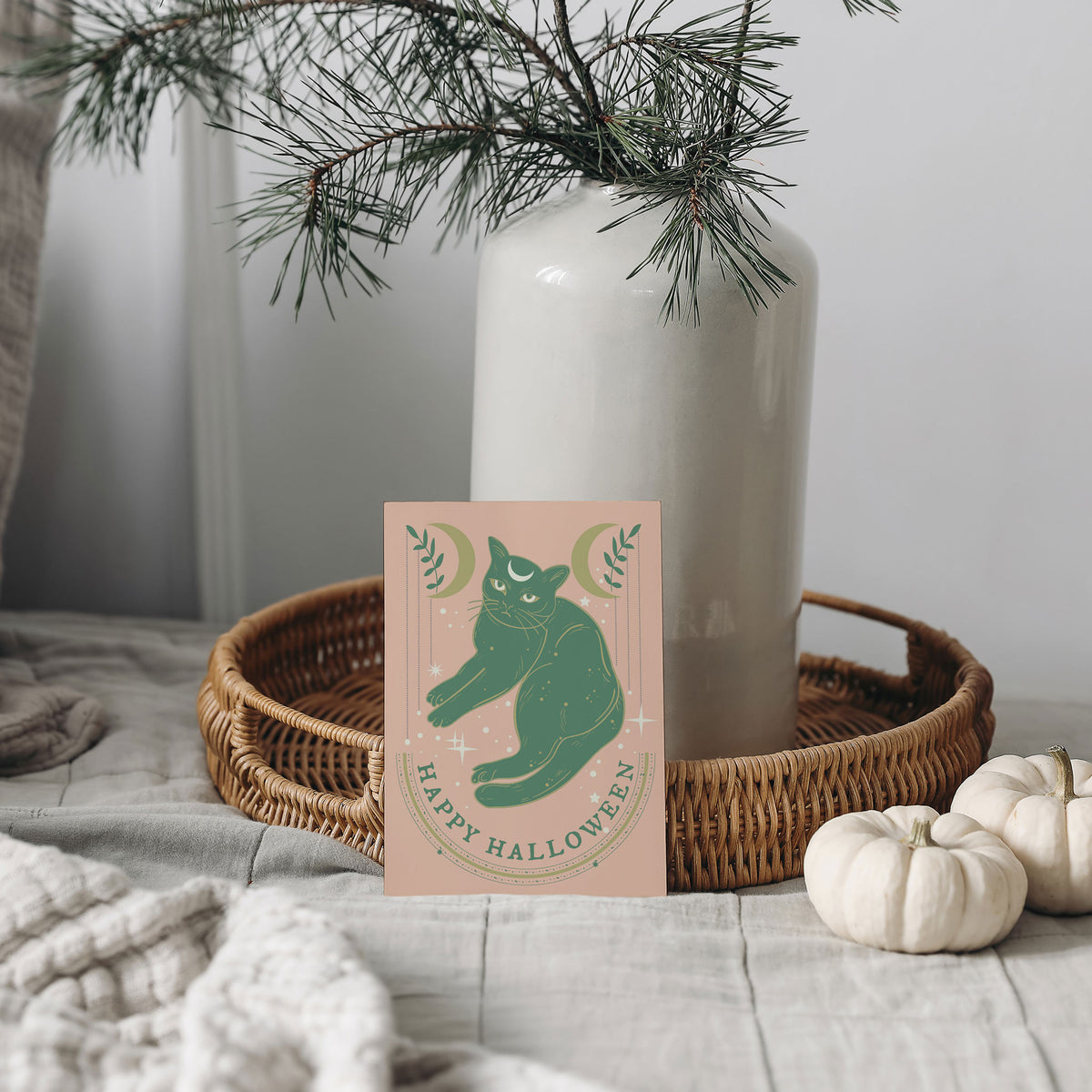 Set of 24 Halloween cards with foliage, stars, and crescent moon graphics in green and cream.
