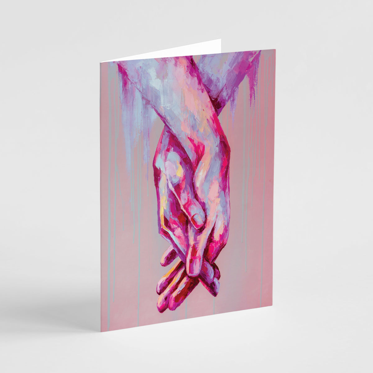 Full-bleed card illustration of two hands with interlaced fingers in pink and lavender tones over a muted rose background, 24
