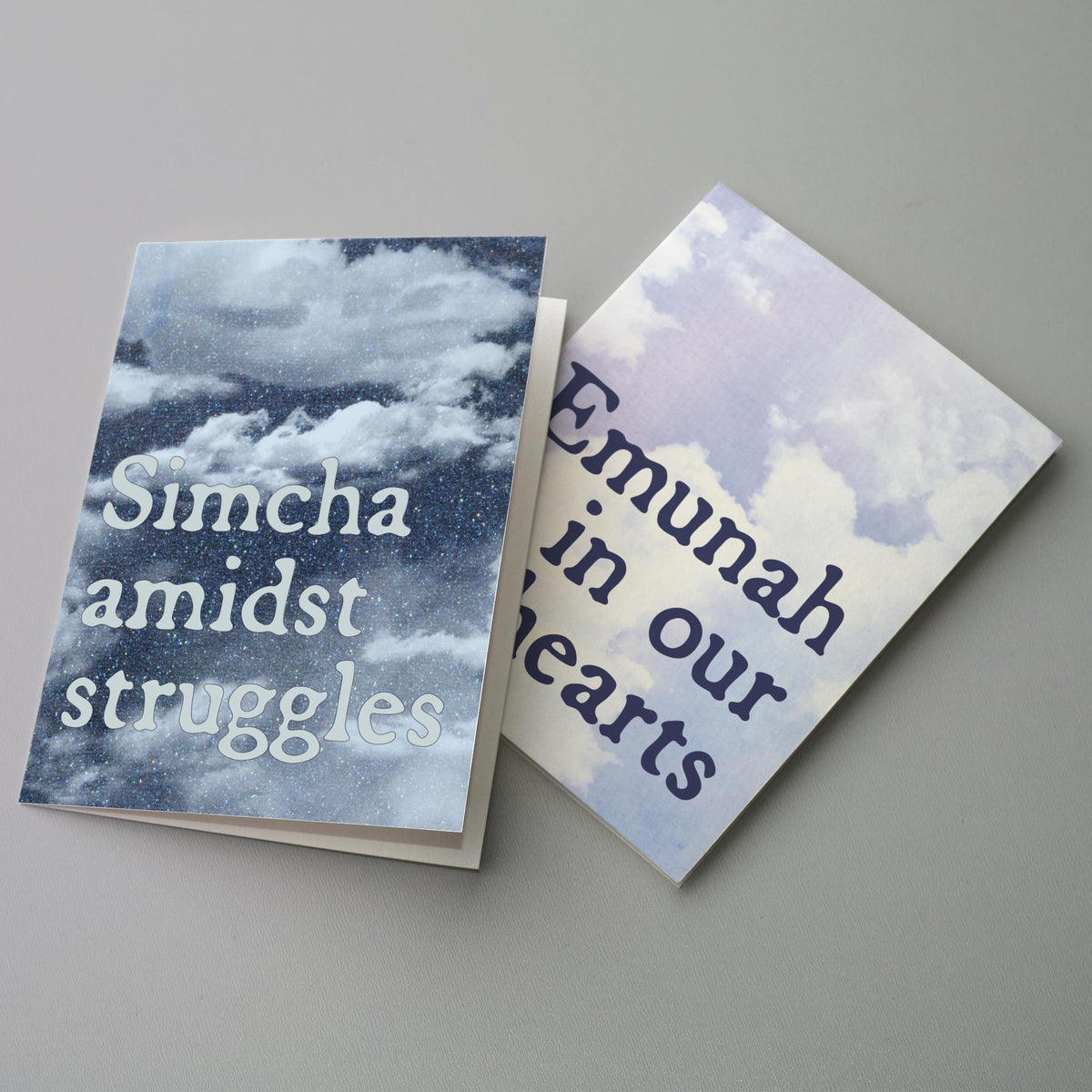 Six-design card set with phrases including "Unity for klal Yisrael" and "Shine in unity, b'simcha."