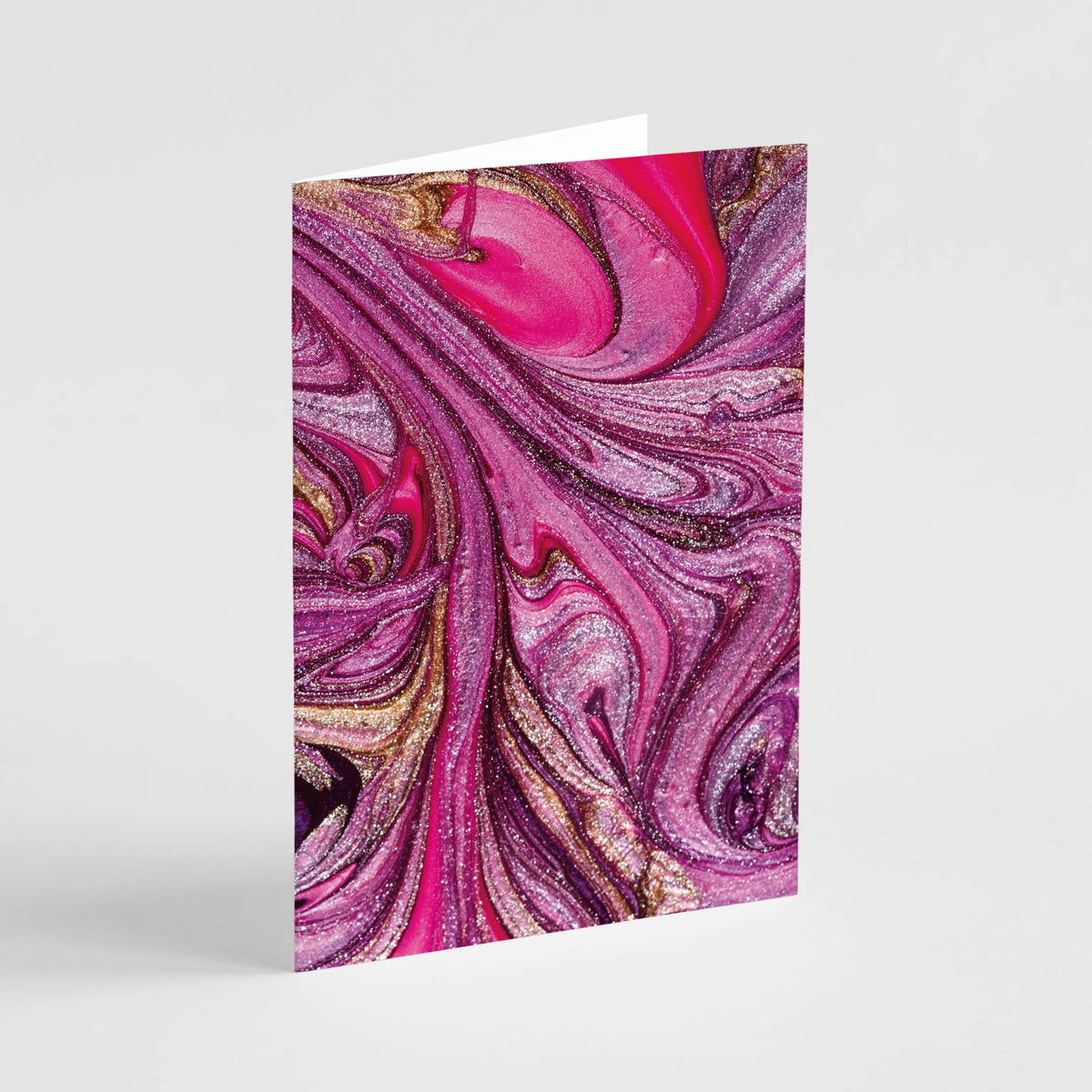 Card set displaying four distinct fluid and textured abstract designs, no text.