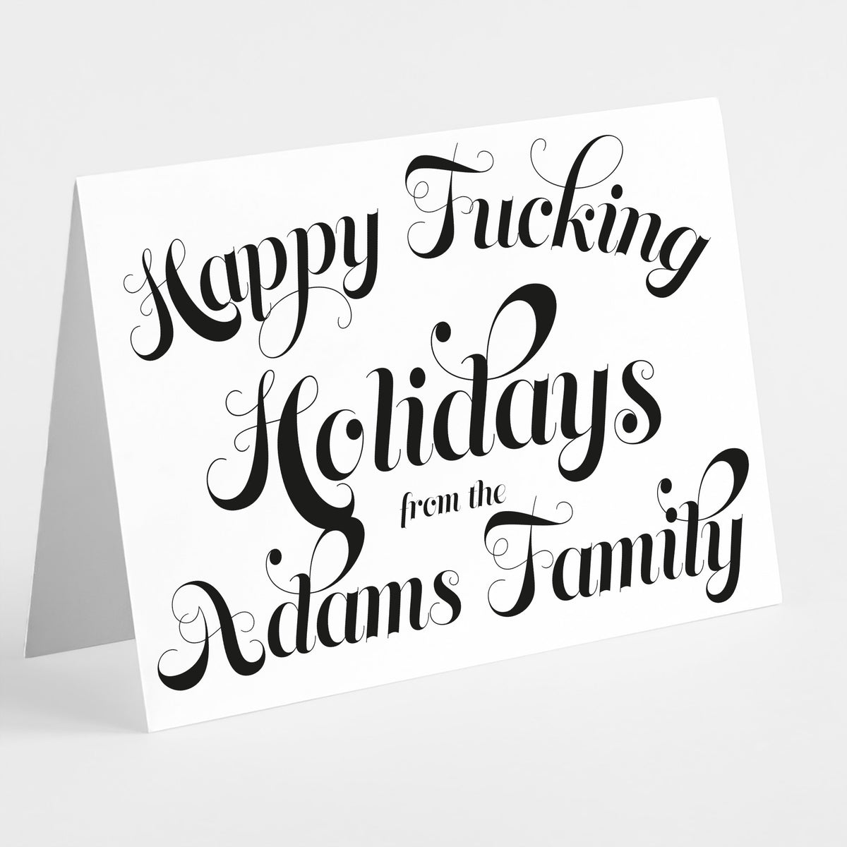 Set of 24 personalized Christmas cards with profanity-inclusive holiday greeting in ornate black calligraphic script.