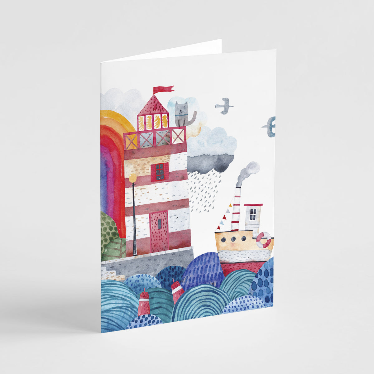 Watercolor lighthouse card set with a gray cat figure seated on a balcony with cross-hatch railing.