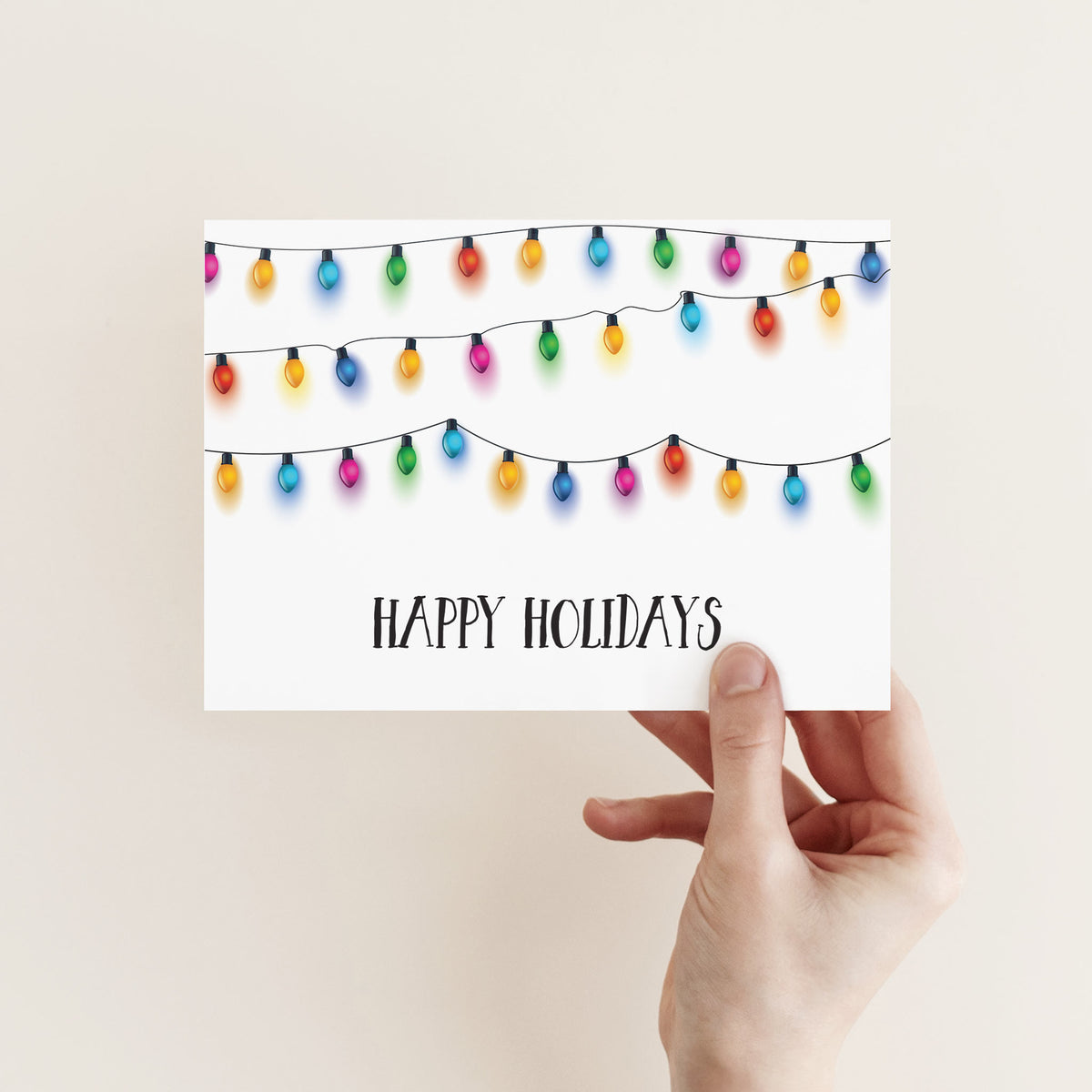 Identical landscape cards with classic string lights in seven colors and a dark navy holiday greeting.