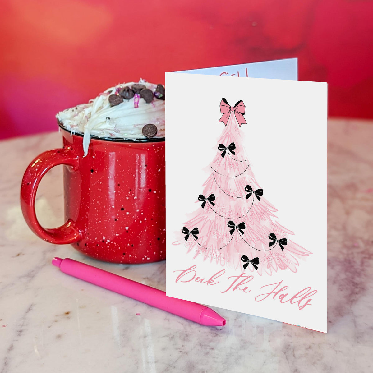 Pack of 24 white cards, eight repeating pink and black holiday designs, most with a script phrase.