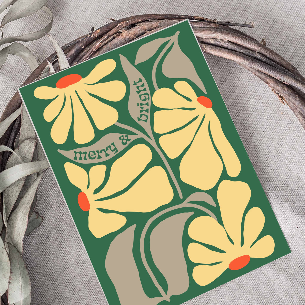 Card set featuring stylized coneflowers, tulips, poppies, daisies, and five-petal blooms with holiday text.